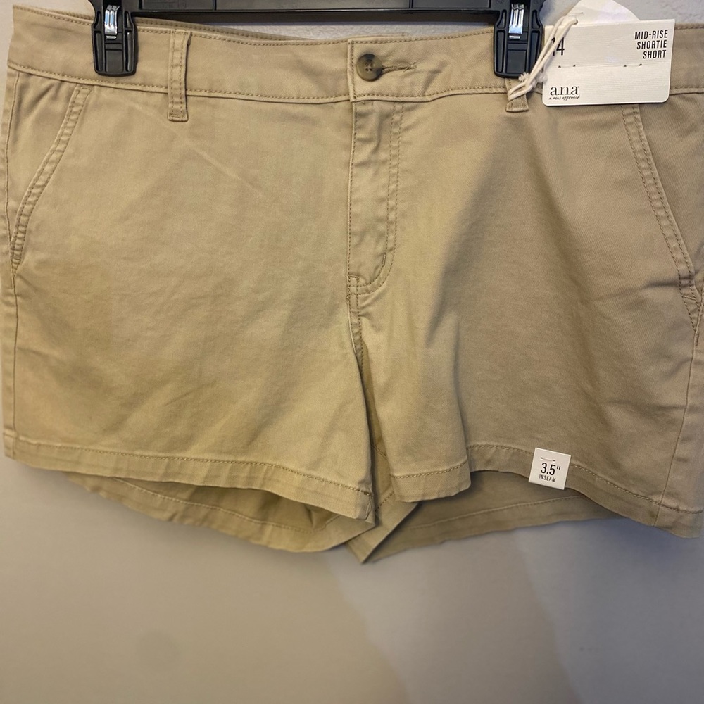 Tan shorts size 14 mid-rise shortie shorts 3.5 inseam has pockets in the front